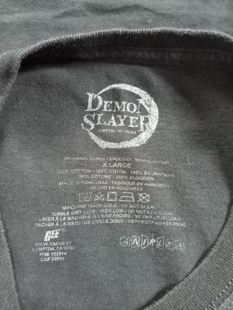 Demon Slayer Tee OPT (Category: Tshirts & Polo Shirts ) located in Cabadbaran. Submitted by reizen_ace051823 (Listing ID 1470024911, Image 3). Description: - condition 9.5/10 - no issue need wash only - size xl on tag - dimes L29 x W21.5.