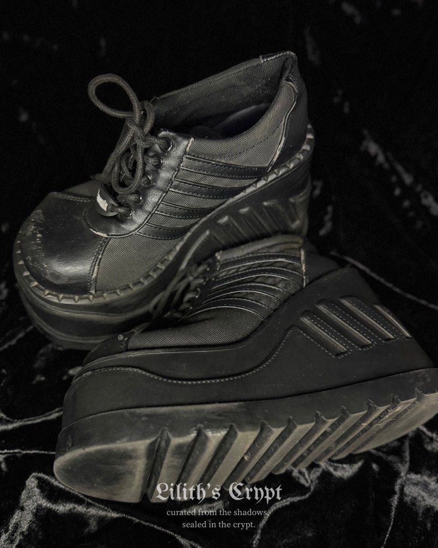 demonia stomp-08 | alt, goth, gothic (Category: Wedges) located in Manila. Submitted by markedbylilith_ (Listing ID 1470045156, Image 3). Description: ┊ ┊ ┊ ✧ size : us 7, eu 37 ✧ insole : 9.5" ✧ height : 4.5" (platform / wedge) ✧ flaw/s : visible peeling/scuffing along the toe caps, edges, and insole as shown 𖤐 iconic chunky platform wedge sneakers with textured ribbed side stripes and metal eyelet lace-up closure 𖤐 signature demonia branded r