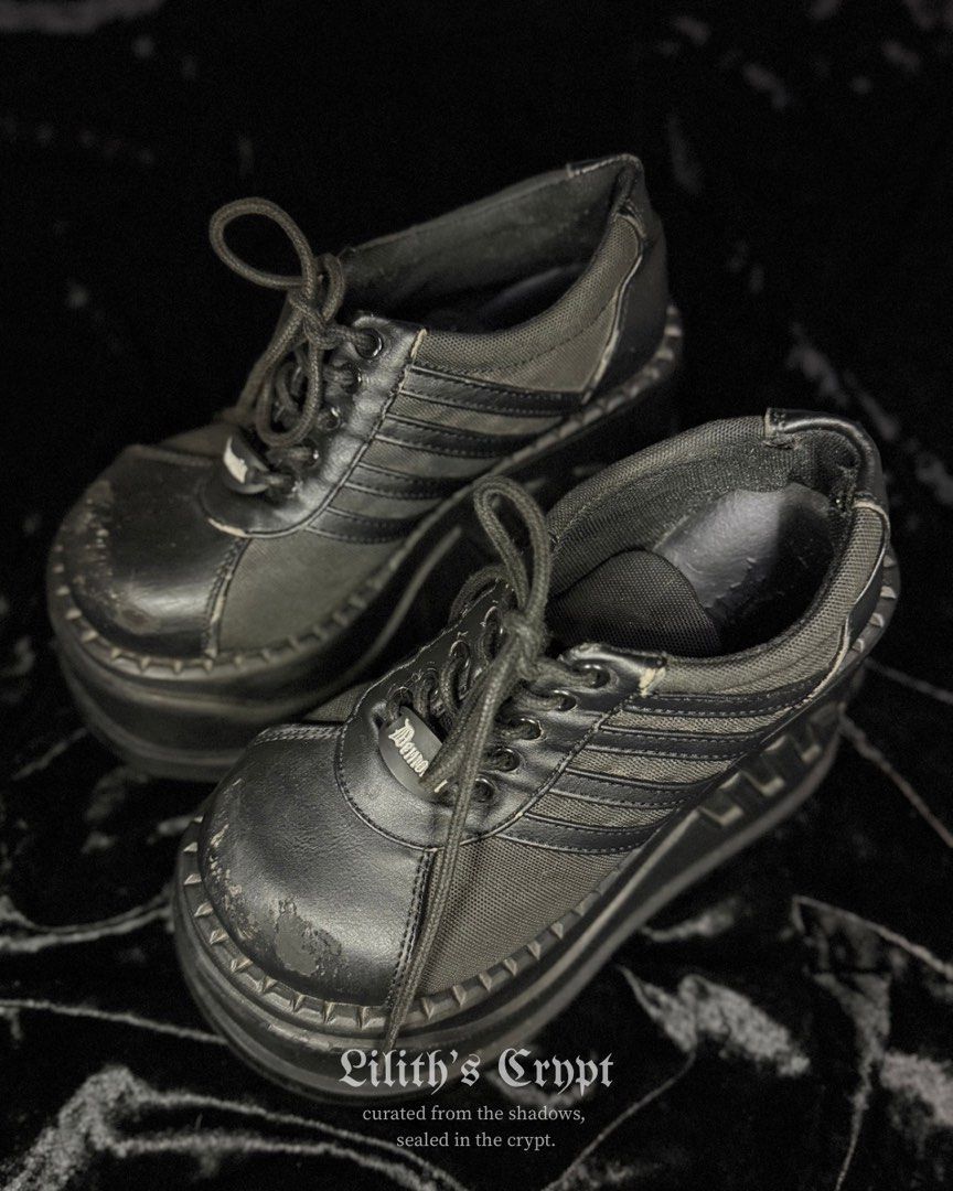 demonia stomp-08 | alt, goth, gothic (Category: Wedges) located in Manila. Submitted by markedbylilith_ (Listing ID 1470045156, Image 2). Description: ┊ ┊ ┊ ✧ size : us 7, eu 37 ✧ insole : 9.5" ✧ height : 4.5" (platform / wedge) ✧ flaw/s : visible peeling/scuffing along the toe caps, edges, and insole as shown 𖤐 iconic chunky platform wedge sneakers with textured ribbed side stripes and metal eyelet lace-up closure 𖤐 signature demonia branded r