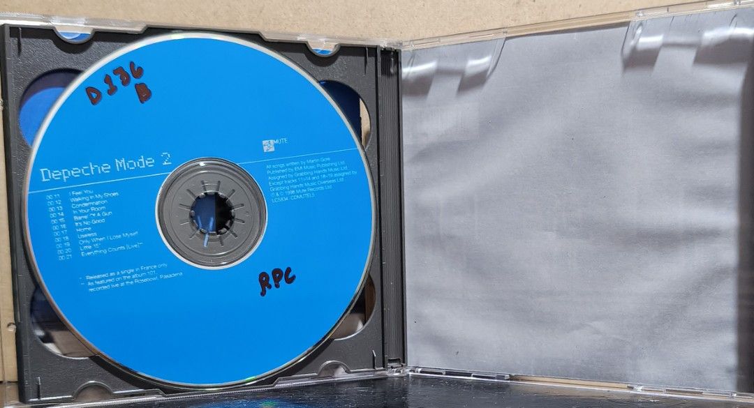 Depeche Mode - The Singles 86>98 Double CD Album (Category: CDs & DVDs) located in Manila. Submitted by ruelcabrer77078 (Listing ID 1470090902, Image 3). Description: - Artist & Title: Depeche Mode - The Singles 86>98 - Label: Mute Records - Format: Double CD set (Includes CD 1 red disc & CD 2 blue disc) - Key Tracks: Stripped, Enjoy The Silence, I Feel You, Personal Jesus - Packaging: Standard double jewel case with rear tracklist and barcode - 