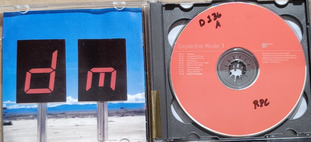 Depeche Mode - The Singles 86>98 Double CD Album (Category: CDs & DVDs) located in Manila. Submitted by ruelcabrer77078 (Listing ID 1470090902, Image 2). Description: - Artist & Title: Depeche Mode - The Singles 86>98 - Label: Mute Records - Format: Double CD set (Includes CD 1 red disc & CD 2 blue disc) - Key Tracks: Stripped, Enjoy The Silence, I Feel You, Personal Jesus - Packaging: Standard double jewel case with rear tracklist and barcode - 