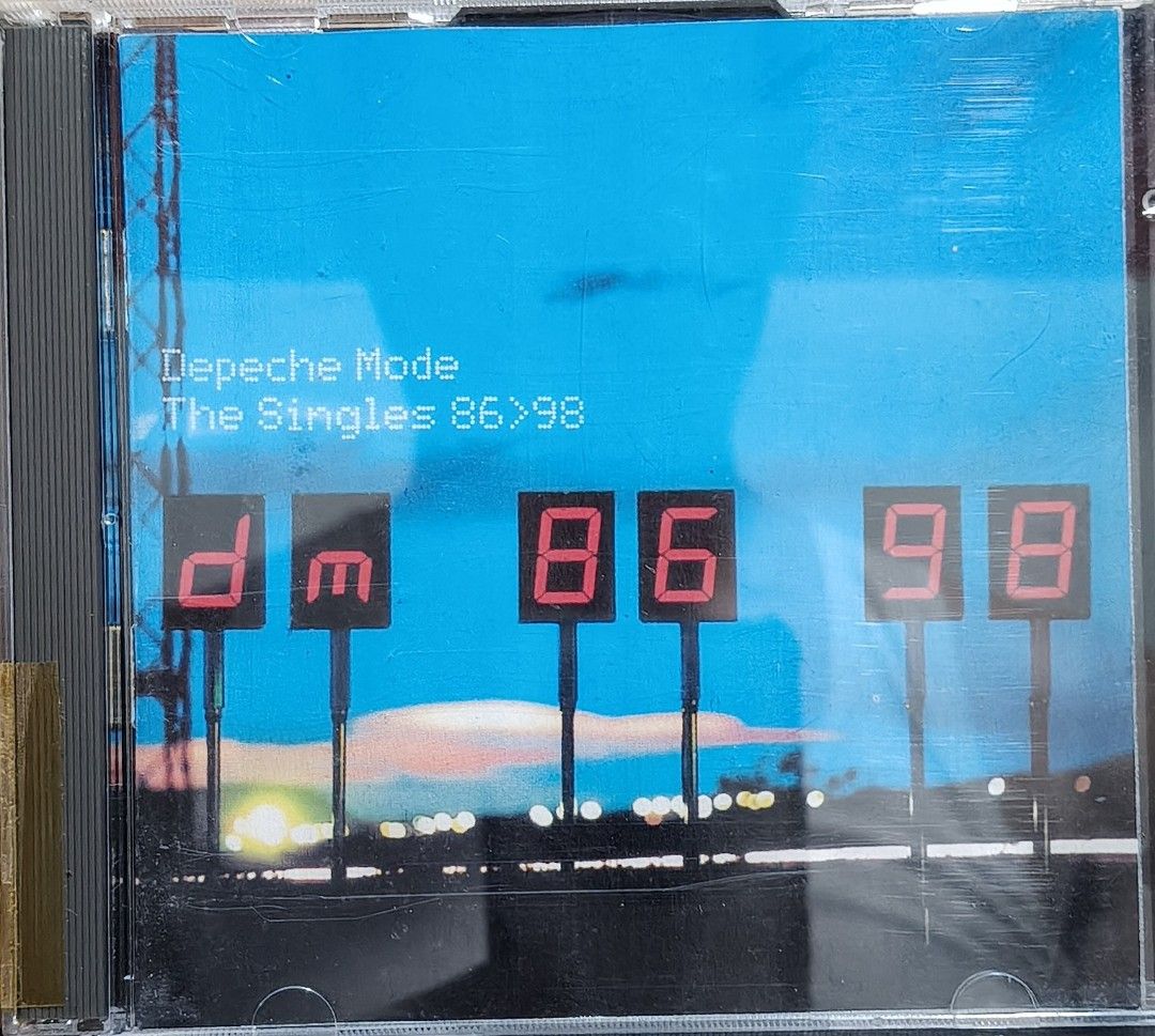 Depeche Mode - The Singles 86>98 Double CD Album (Category: CDs & DVDs) located in Manila. Submitted by ruelcabrer77078 (Listing ID 1470090902, Image 1). Description: - Artist & Title: Depeche Mode - The Singles 86>98 - Label: Mute Records - Format: Double CD set (Includes CD 1 red disc & CD 2 blue disc) - Key Tracks: Stripped, Enjoy The Silence, I Feel You, Personal Jesus - Packaging: Standard double jewel case with rear tracklist and barcode - 