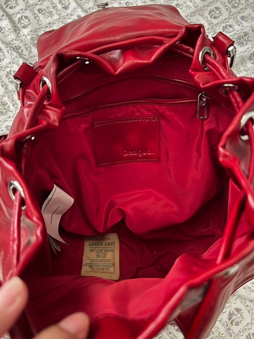 Desigual RED Pocket-Equipped Graffiti-Style Mini Backpack (Category: Backpacks) located in Quezon City. Submitted by chibicore (Listing ID 1470033917, Image 3). Description: Bought from Z4lora for 3.7k₱ *Still brand new , barely used only work once or twice *No dust bag included *rfs: impulse buy 😓 *Backpack style with many pockets including back zipper Loc: Eastwood City, Quezon City.