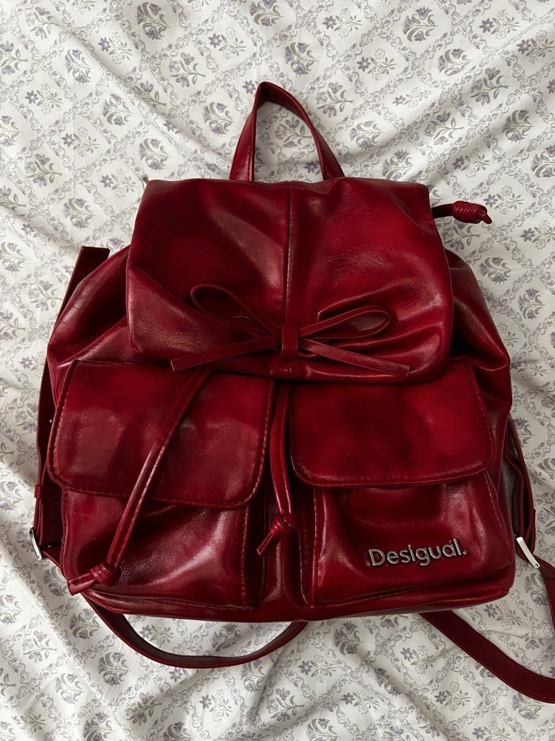 Desigual RED Pocket-Equipped Graffiti-Style Mini Backpack (Category: Backpacks) located in Quezon City. Submitted by chibicore (Listing ID 1470033917, Image 2). Description: Bought from Z4lora for 3.7k₱ *Still brand new , barely used only work once or twice *No dust bag included *rfs: impulse buy 😓 *Backpack style with many pockets including back zipper Loc: Eastwood City, Quezon City.