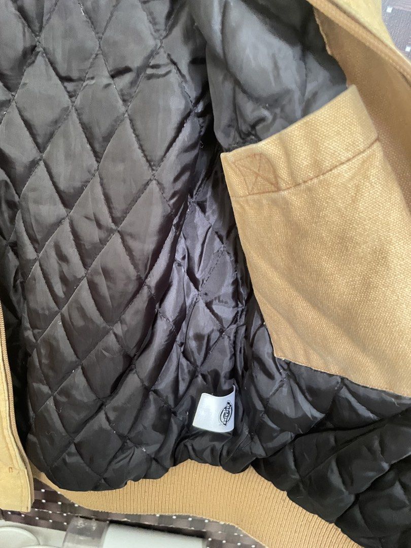Dickies Active Canvas Work Jacket (Category: Coats, Jackets and Outerwear) located in Minglanilla. Submitted by briksgwapo07 (Listing ID 1469995096, Image 3). Description: - Brand: Dickies - Item: Duck Canvas Work Jacket - Color: Brown - Size: Small - Lining: Quilted black lining for extra warmth - Features: Full zip front, drawstring hood, front pockets, and classic logo patch - Details: Ribbed cuffs and hem to block the wind - Condition: Durabl