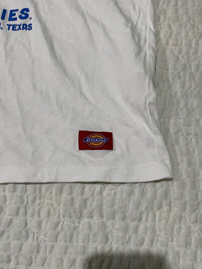 Dickies Good Work Clothes Since 1922 Graphic Tee White (Category: Tshirts & Polo Shirts ) located in Iloilo. Submitted by chapxythriftshop (Listing ID 1470070609, Image 2). Description: - Brand: Dickies - Color: White - Size: Small (Red neck label) - Design: Vintage 'Good Work Clothes Since 1922' Fort Worth, Texas graphic with boy illustration - Details: Small woven logo patch on bottom left hem - Material: Clean, comfortable cotton - Condition: 