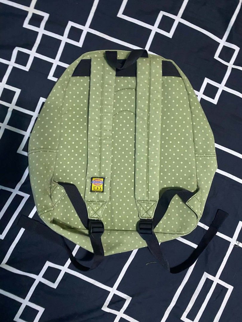 Dickies Green Polka Dot Backpack with Front Pocket (Category: Backpacks) located in Manila. Submitted by fareastthrift (Listing ID 1470015955, Image 2). Description: - Style: Classic retro school backpack - Material & Design: Green canvas with white polka dots - Pockets: Dark green front zip pocket with red Dickies logo patch - Details: Brown diamond lash tab and yellow Dickies USA logo tag - Straps: Padded with adjustable black nylon webbing - P