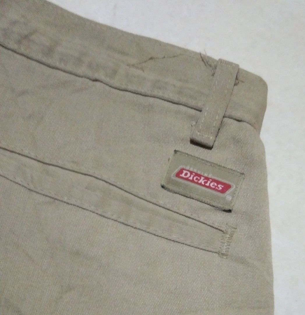 Dickies Men's Beige Cargo Shorts Size 38 (Category: Shorts) located in Manila. Submitted by aj.bermundo (Listing ID 1470061787, Image 2). Description: - Brand: Dickies - Color: Beige - Size: 38 - Material: 65% Polyester, 35% Cotton blend - Fit: Standard fit, knee-length - Features: Button closure, belt loops, practical cargo pockets, signature logo tags on back pocket and lower hem - Origin: Made in Honduras.