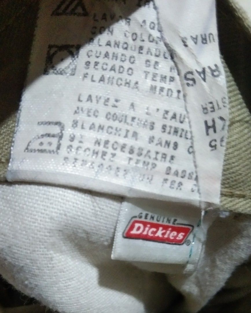 Dickies Men's Beige Cargo Shorts Size 38 (Category: Shorts) located in Manila. Submitted by aj.bermundo (Listing ID 1470061787, Image 3). Description: - Brand: Dickies - Color: Beige - Size: 38 - Material: 65% Polyester, 35% Cotton blend - Fit: Standard fit, knee-length - Features: Button closure, belt loops, practical cargo pockets, signature logo tags on back pocket and lower hem - Origin: Made in Honduras.