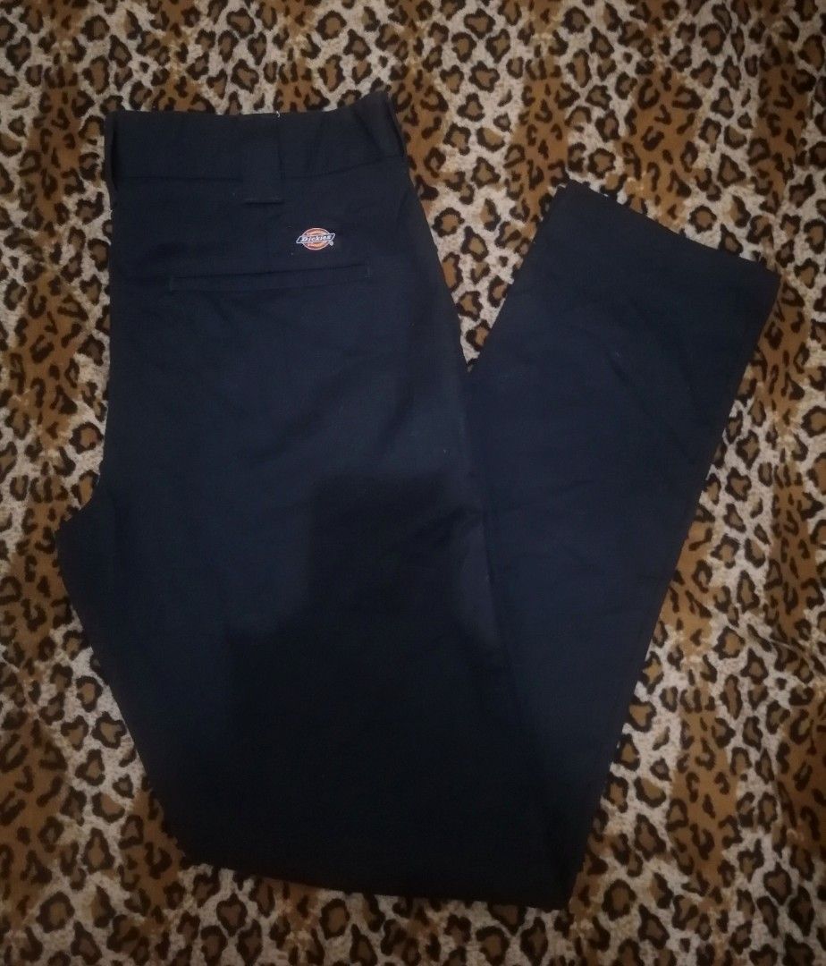 Dickies Slim Fit Work Pants Navy (Category: Trousers) located in Cebu City. Submitted by roadthrift (Listing ID 1470135402, Image 3). Description: - Brand: Dickies - Style: Slim fit work trousers - Color: Dark navy blue - Details: Classic logo patch on back pocket, branded inner waistband lining - Material: Durable and made for everyday wear - Condition: Clean and ready to go.