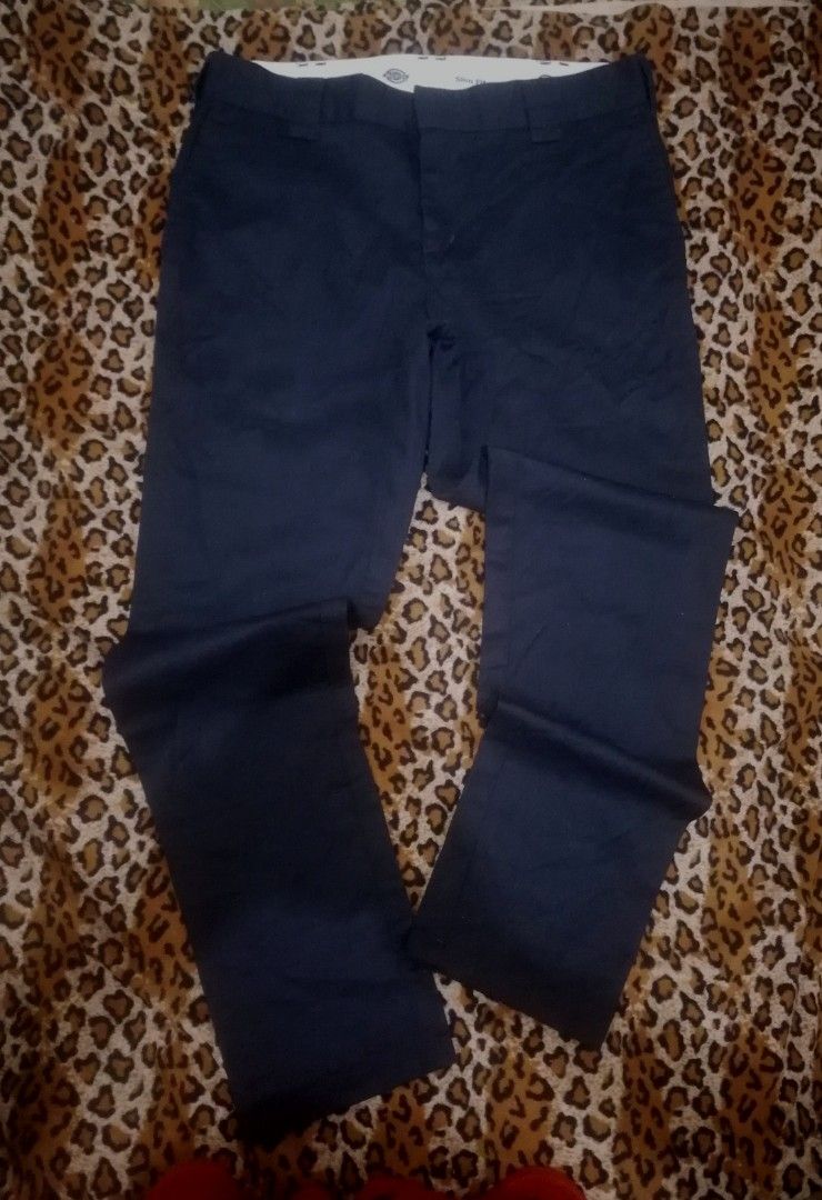 Dickies Slim Fit Work Pants Navy (Category: Trousers) located in Cebu City. Submitted by roadthrift (Listing ID 1470135402, Image 1). Description: - Brand: Dickies - Style: Slim fit work trousers - Color: Dark navy blue - Details: Classic logo patch on back pocket, branded inner waistband lining - Material: Durable and made for everyday wear - Condition: Clean and ready to go.