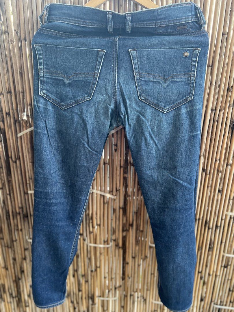Diesel Industry Blue Denim Jeans (Category: Jeans) located in Taguig. Submitted by bestthriftxx (Listing ID 1470011581, Image 2). Description: - Brand: Diesel Industry - Color/Wash: Blue with faded wash and front thigh whiskering - Fit: Regular fit with standard straight legs - Details: Classic five-pocket styling, contrast topstitching, button fly closure, branded hardware, and back pocket logo patch - Condition: Excellent / Ready to wear.