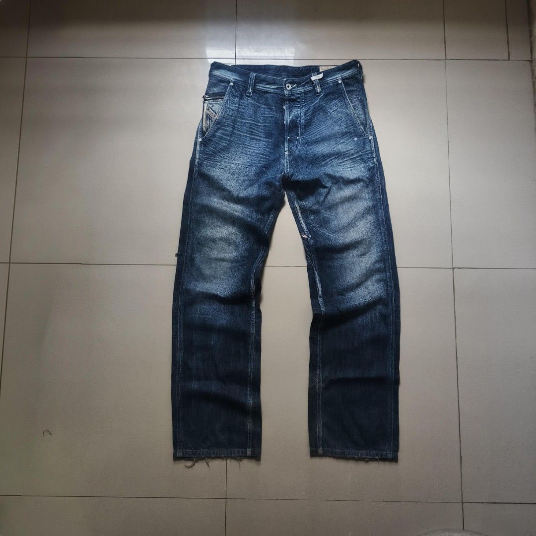 Diesel Pheyo Wash 008SS Button Fly Denim Jeans (Category: Jeans) located in Iloilo. Submitted by lizardooo (Listing ID 1469963488, Image 1). Description: - Brand: Diesel - Model: Pheyos Jeans - Wash: 008SS (Medium blue with fading and whiskering) - Size: W30 L32 - Fit: Straight leg with trendy distressed hems - Closure: Button fly - Unique Details: Zippered coin pocket with yellow logo pull and back cinched buckle waist strap - Condition: Excelle