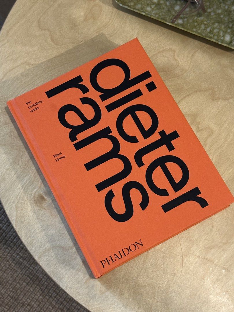 Dieter Rams: The Complete Works by Klaus Klemp Phaidon (Category: Storybooks) located in Pasig City. Submitted by cosmicjuice08 (Listing ID 1470043410, Image 3). Description: - Title: Dieter Rams: The Complete Works - Author: Klaus Klemp - Publisher: Phaidon - Format: Orange hardcover - Content: Comprehensive history of industrial and product design, featuring Rams's work for Braun and Vitsœ with chronological organization - Excellent Condition: 