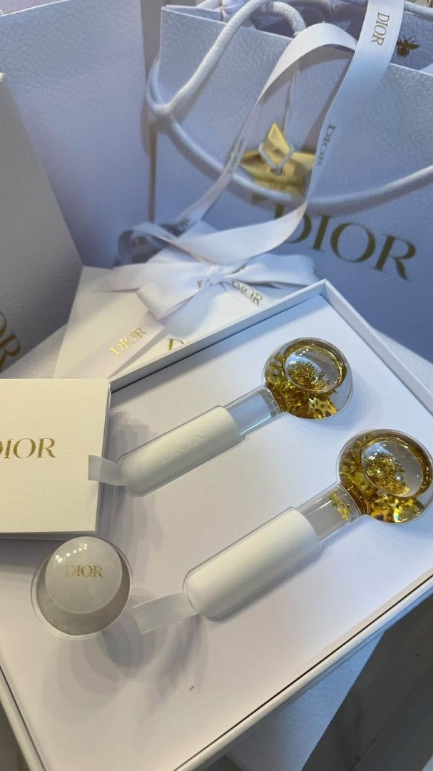 DIOR Cryo Facial Globes Set with Packaging (Category: Face Care) located in Makati City. Submitted by mariaasevilla0622eb (Listing ID 1470002810, Image 1). Description: - 100% Authentic DIOR Facial Massage Globes - Features stunning glass globes filled with shimmering gold glitter and elegant white handles with the iconic Dior logo - Provides a soothing and de-puffing cooling effect for your daily skincare routine - Comes complete with the origin