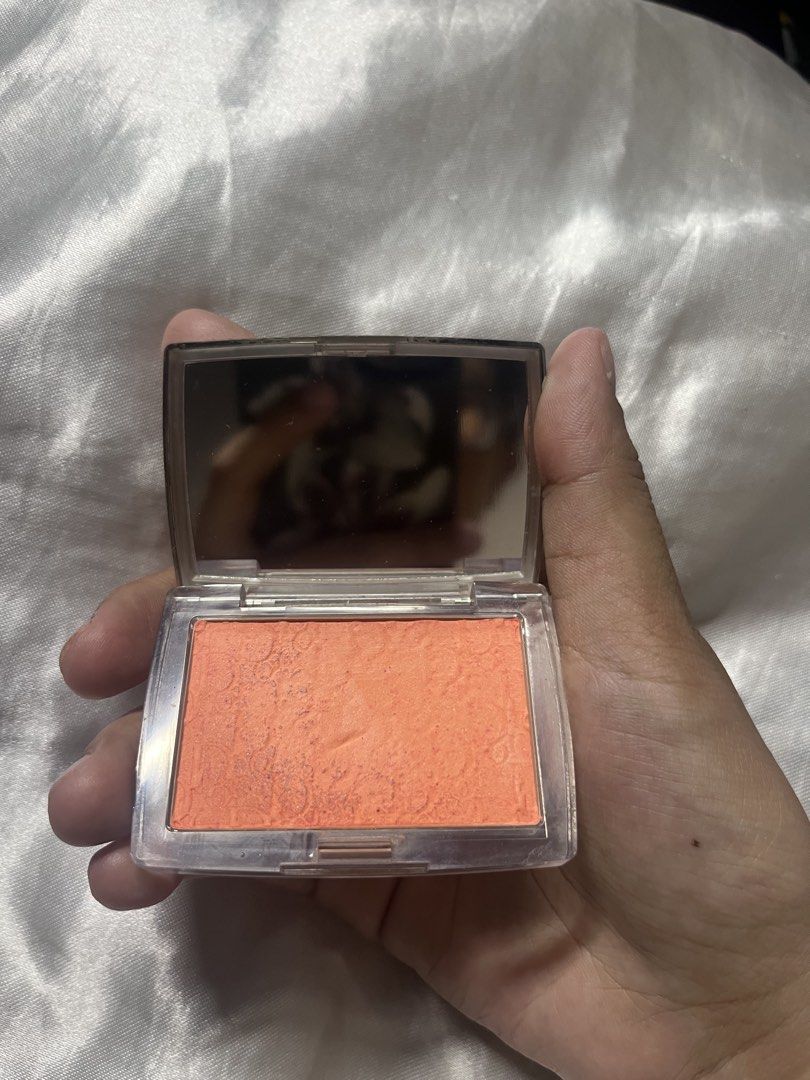 Dior Rosy Glow Blush in Coral (Category: Makeup) located in Manila. Submitted by newaccountdotcom (Listing ID 1470079643, Image 2). Description: - old formula - bought march 2025 in store - product only - Batch code: 3M02 - Condition: Light use on powder, normal minor surface wear on silver exterior and back plate from storage - RFS: not my preferred shade, decluttering - MOP: gcash/maya - MOD: delivery (lalamove - buyer will shoulder shipping fe