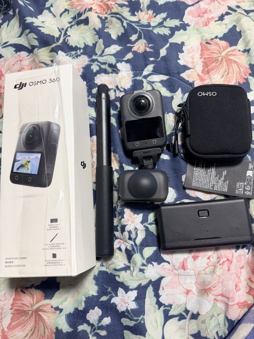 DJI Osmo 360 Adventure Combo (Category: Video Cameras) located in Quezon City. Submitted by BAYMAX72 (Listing ID 1470001336, Image 1). Description: - Complete DJI Osmo 360 Adventure Bundle with original retail box - Condition: zero scratches on the body but there a small scratch sa front lens but doesn’t affect output - DJI Osmo 360 camera unit - 1.2m invisible selfie stick - Battery charging case with three extreme batteries - Protective pouch a