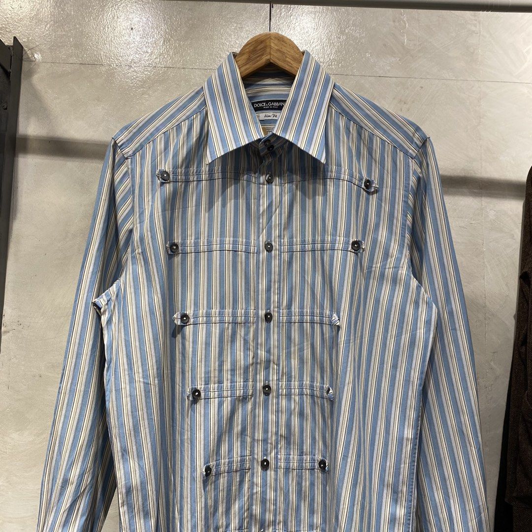 Dolce & Gabbana Napoleon Longsleeve FW/06 (Category: Luxury Apparel) located in Quezon City. Submitted by rebirthalley (Listing ID 1470028313, Image 3). Description: This is the Dolce & Gabbana Fall/Winter 2006 Blue Striped Officer Napoleon Shirt. • Brand / Collection: Dolce & Gabbana, Fall/Winter 2006 (FW2006) • Design & Details: Features vertical blue, white, and beige stripes with a tailored slim fit and distinctive metal Napoleon-style button