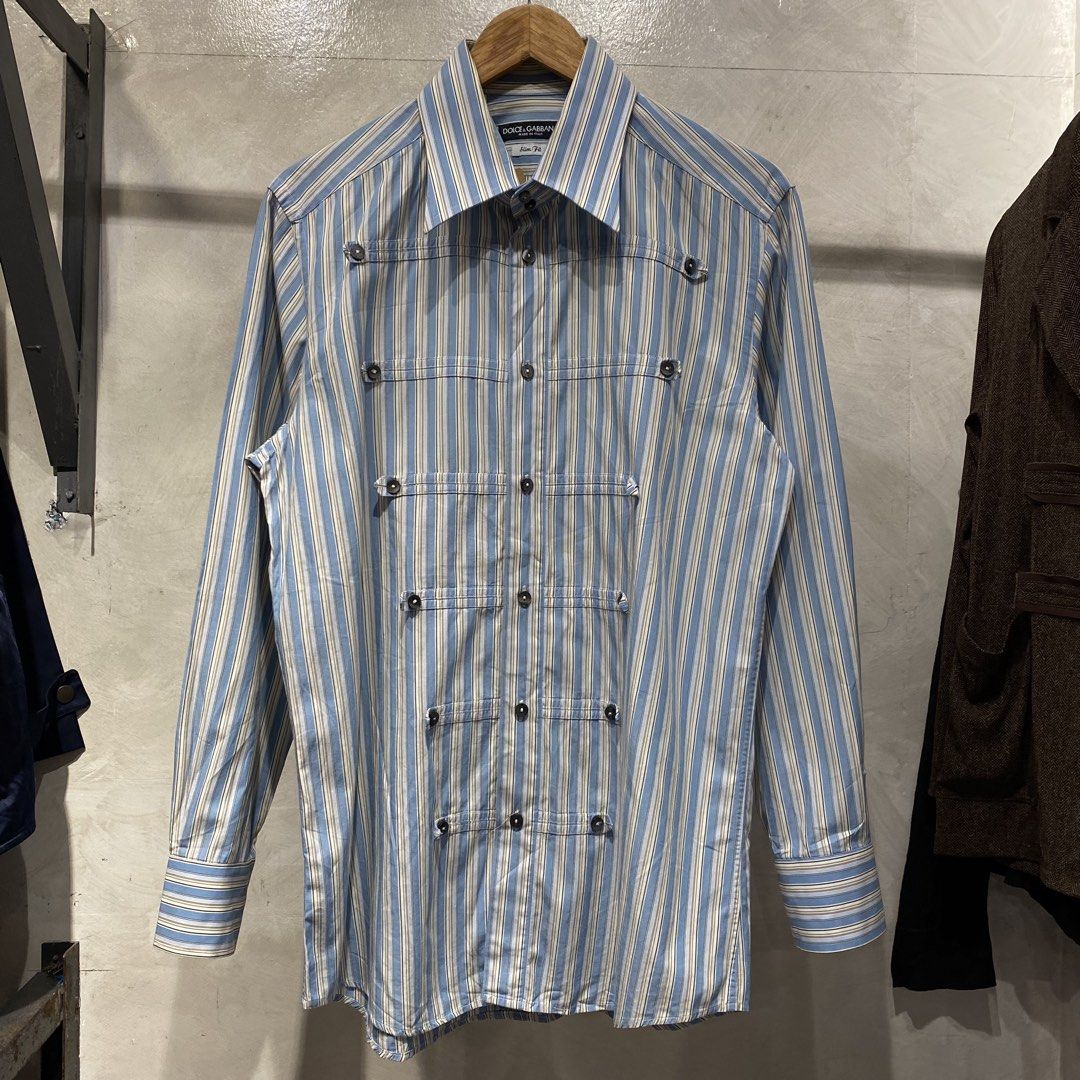 Dolce & Gabbana Napoleon Longsleeve FW/06 (Category: Luxury Apparel) located in Quezon City. Submitted by rebirthalley (Listing ID 1470028313, Image 2). Description: This is the Dolce & Gabbana Fall/Winter 2006 Blue Striped Officer Napoleon Shirt. • Brand / Collection: Dolce & Gabbana, Fall/Winter 2006 (FW2006) • Design & Details: Features vertical blue, white, and beige stripes with a tailored slim fit and distinctive metal Napoleon-style button