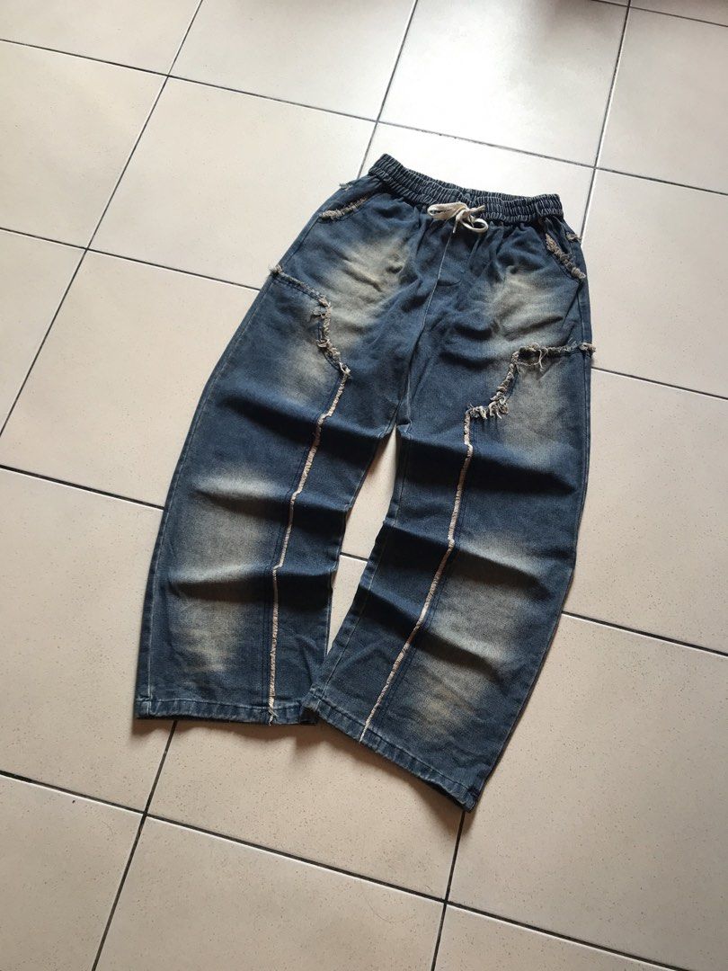 Double Knee Baggy Denim Pants (Category: Jeans) located in Cebu City. Submitted by no3spass1ng (Listing ID 1469994226, Image 2). Description: Double Knee Baggy Denim Pants Waist:28-34 Length:41 Hem:10.5 very good condition see pics .