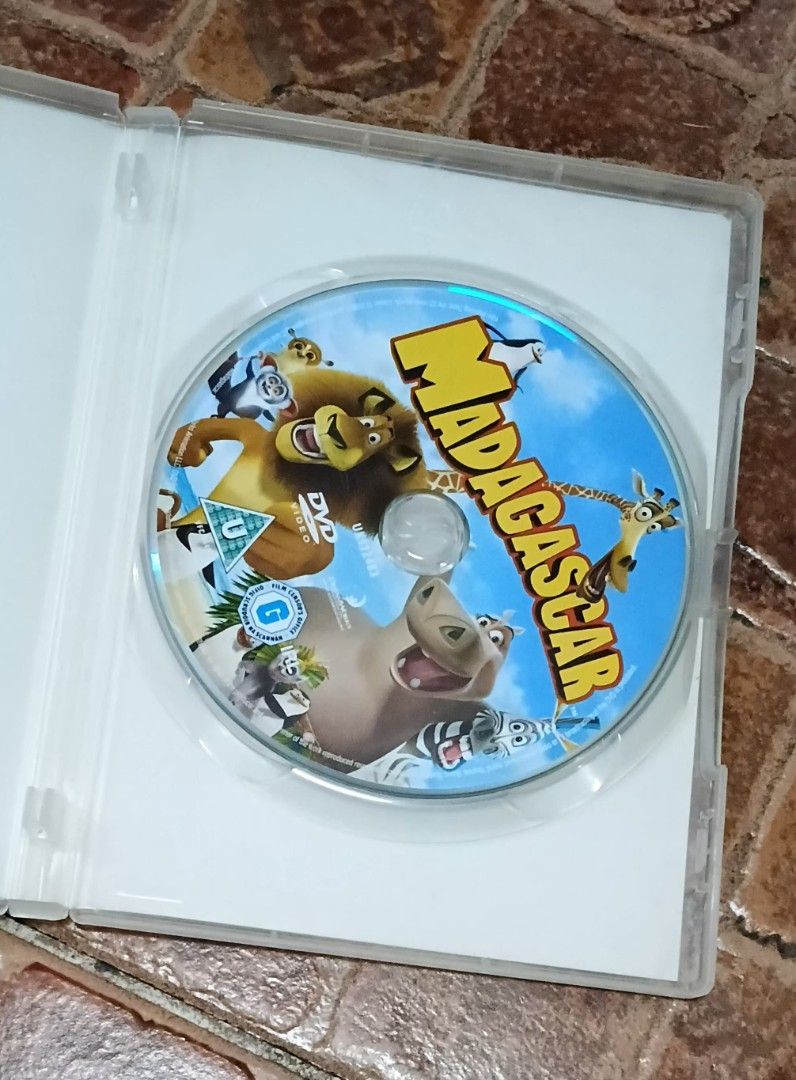 DreamWorks Madagascar DVD Movie (Category: CDs & DVDs) located in Quezon City. Submitted by dancatz (Listing ID 1470066446, Image 2). Description: □ P 150.00 - Movie: Madagascar Animated Comedy on DVD - Condition: Disc and original case in solid, great shape - Rating: Rated U (Universal viewing for all ages) - Audio/Subs: English audio and subtitles included - Special Features: Music video, behind-the-scenes footage, and fun activities - region 2