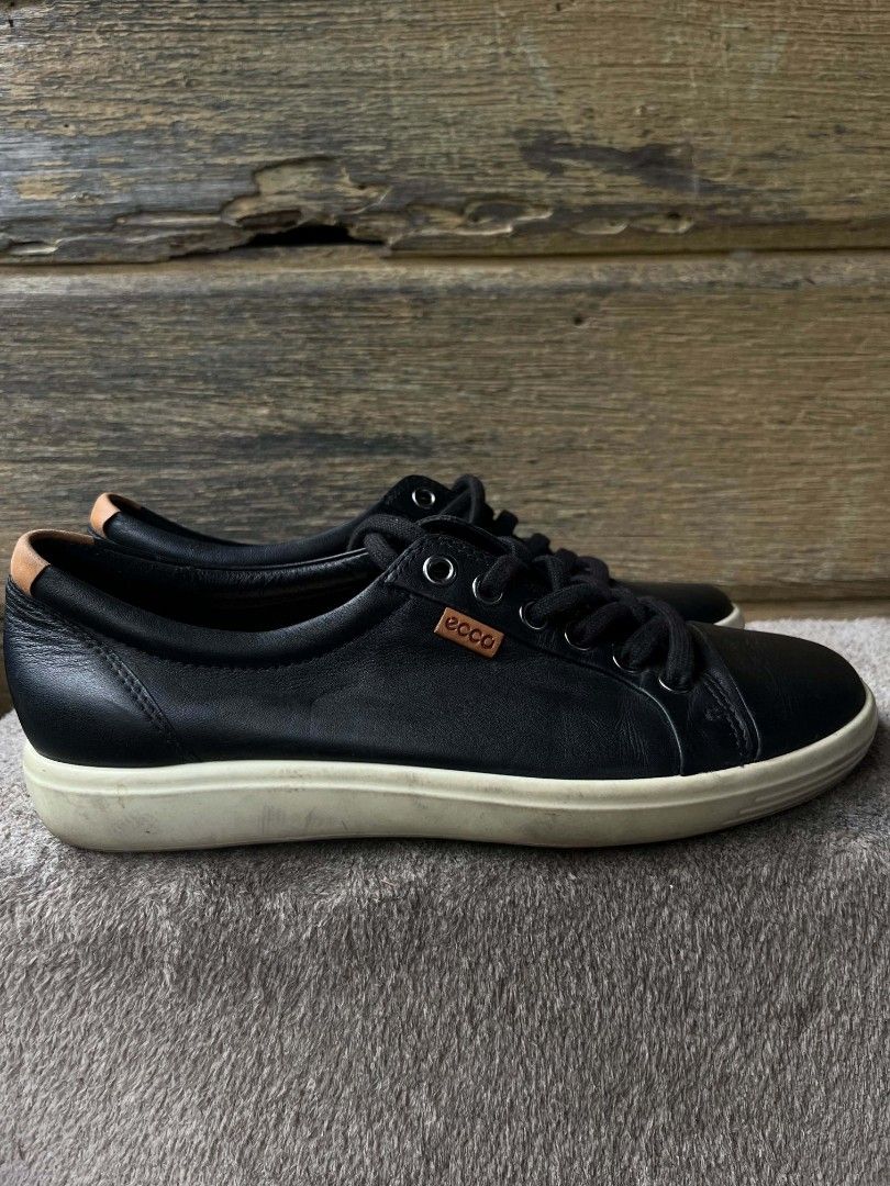 ECCO Black Leather Casual Sneakers Size 37 (Category: Sneakers) located in Baroy. Submitted by laudecarlfe24 (Listing ID 1470042679, Image 3). Description: - Brand: ECCO - Color: Black leather with contrasting off-white sole - Size: EU 37 (Regular Width) - Features: Metal eyelets, black laces, subtle side branding, and tan heel pull tab - Sole: Dot tread pattern with minor dirt marks on the sides - Condition: Uppers are clean, interior tag indica