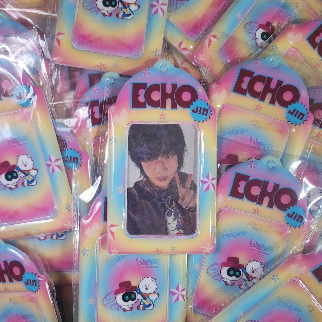 Echo Jin Echo TinyMoon Creations Photocard Holder (Category: K-Wave Merchandise) located in Manila. Submitted by _sj1204 (Listing ID 1469947861, Image 2). Description: - Brand: TinyMoon Creations - Design: Echo Jin (Rainbow with colorful stars and cute characters) - Features: Clear front sleeve for easy display, protective backing insert included - Condition: Brand new, sealed in original plastic packaging - Ideal for: K-pop collectors and photoc