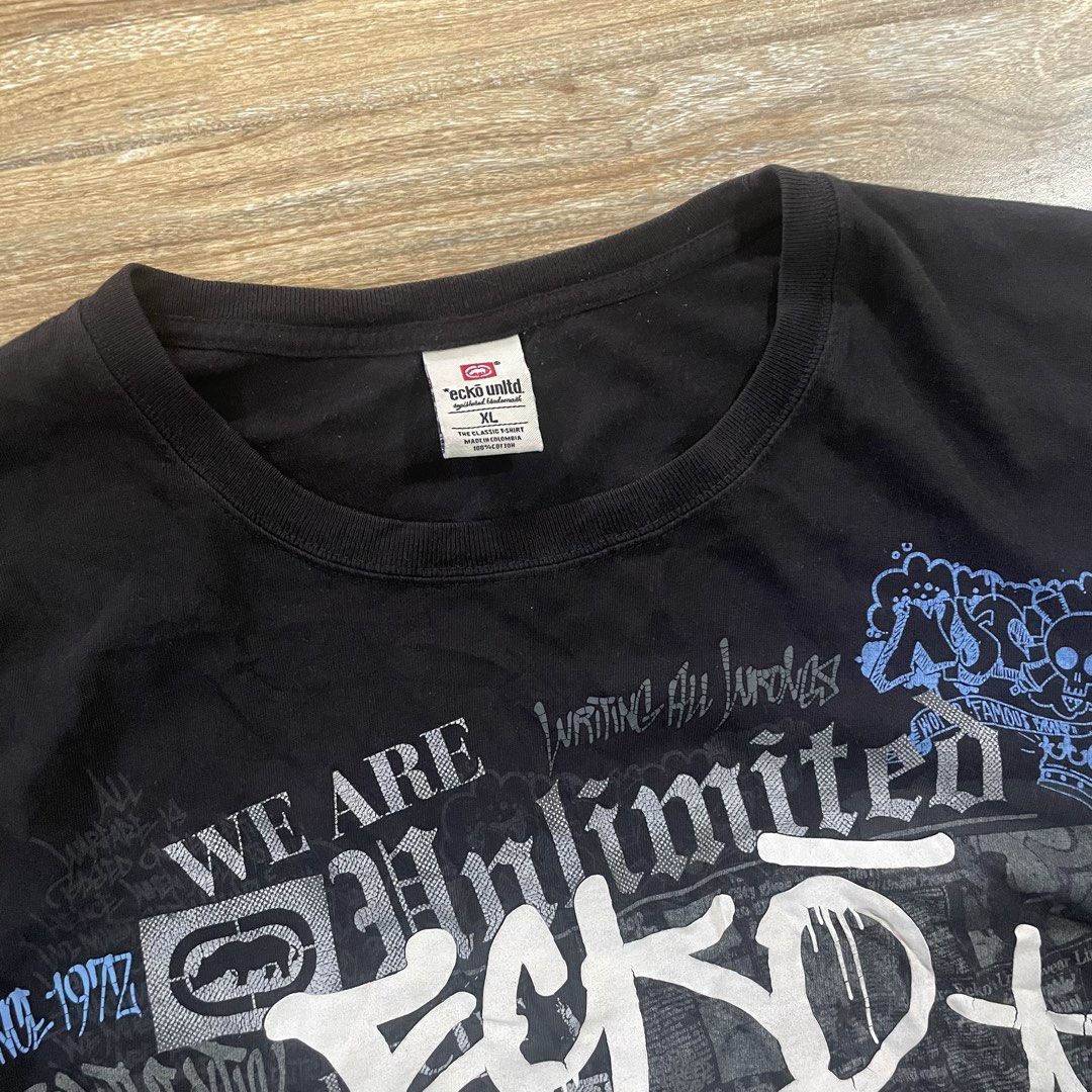 Ecko Unltd Graffiti Print Black T-Shirt XL (Category: Tshirts & Polo Shirts ) located in Cebu City. Submitted by trashloots.ceb (Listing ID 1469971421, Image 3). Description: VINTAGE Y2K ECKO‼️ EXCELLENT Size: XL W 24/ L30 COLORATE 9.5/ 10 ISSUE : Crack Prints PRICE + SF🛒🛒 📍CEBU , SAN FERNANDO 🚚 J&T EXPRESS.