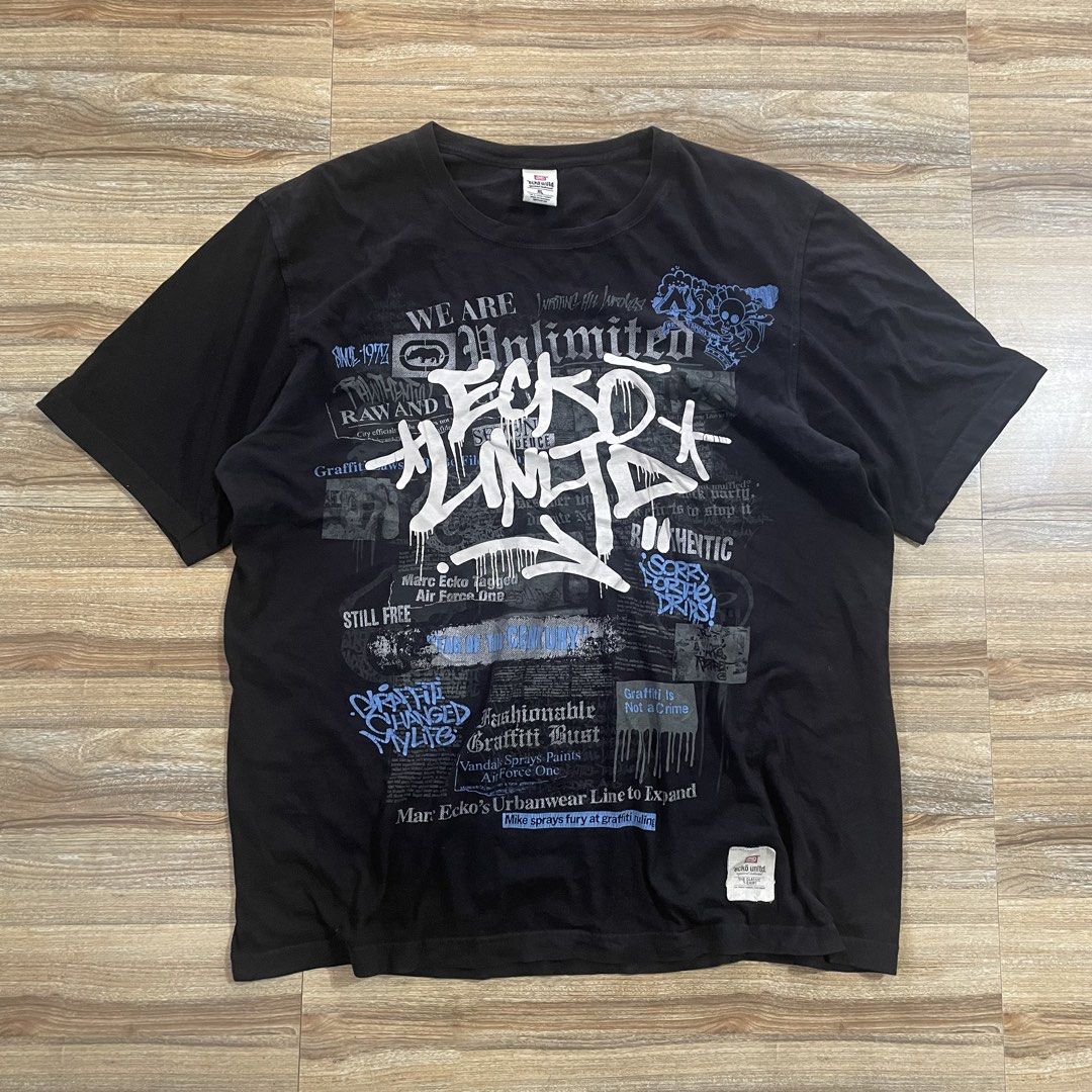 Ecko Unltd Graffiti Print Black T-Shirt XL (Category: Tshirts & Polo Shirts ) located in Cebu City. Submitted by trashloots.ceb (Listing ID 1469971421, Image 1). Description: VINTAGE Y2K ECKO‼️ EXCELLENT Size: XL W 24/ L30 COLORATE 9.5/ 10 ISSUE : Crack Prints PRICE + SF🛒🛒 📍CEBU , SAN FERNANDO 🚚 J&T EXPRESS.