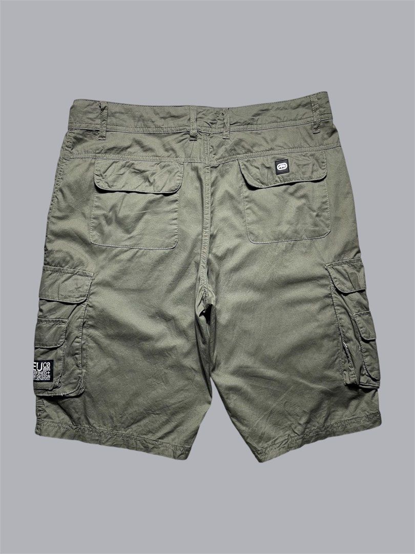 Ecko Unltd olive green utility cargo shorts (Category: Shorts) located in Quezon City. Submitted by renovare.196 (Listing ID 1470075973, Image 2). Description: Ecko Unltd olive green utility cargo shorts Excellent Condition Color Rate: 9.5/10 No Issue Measurements • Width: 34 • Length: 22 • Hem: 10.5 Price: 850 obo DM IF INTERESTED📥.