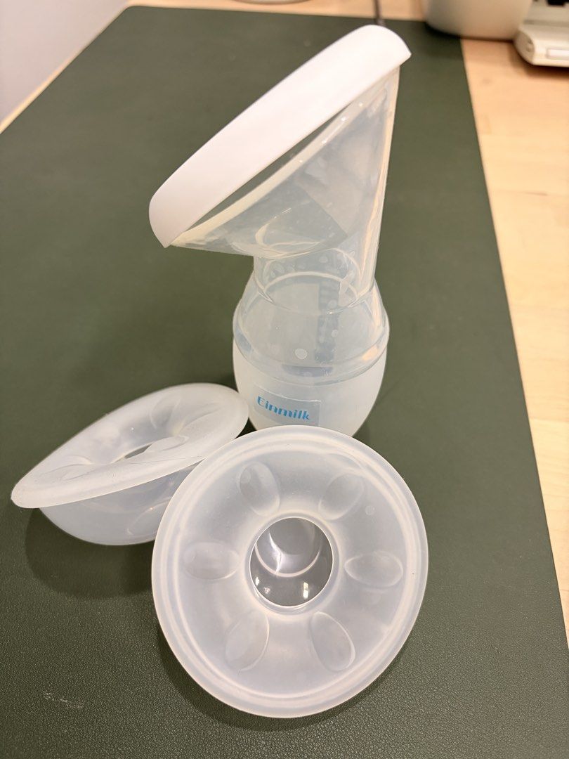 Einmilk and Dr Isla breast milk collector (Category: Breastfeeding & Bottle Feeding) located in Pasig City. Submitted by eterno_ph (Listing ID 1470013849, Image 1). Description: - Brand: Einmilk and Dr. Isla - Condition: Cleaned. Please sterilize before use - you can buy them separately: Einmilk ₱95; Dr. Isla ₱65.