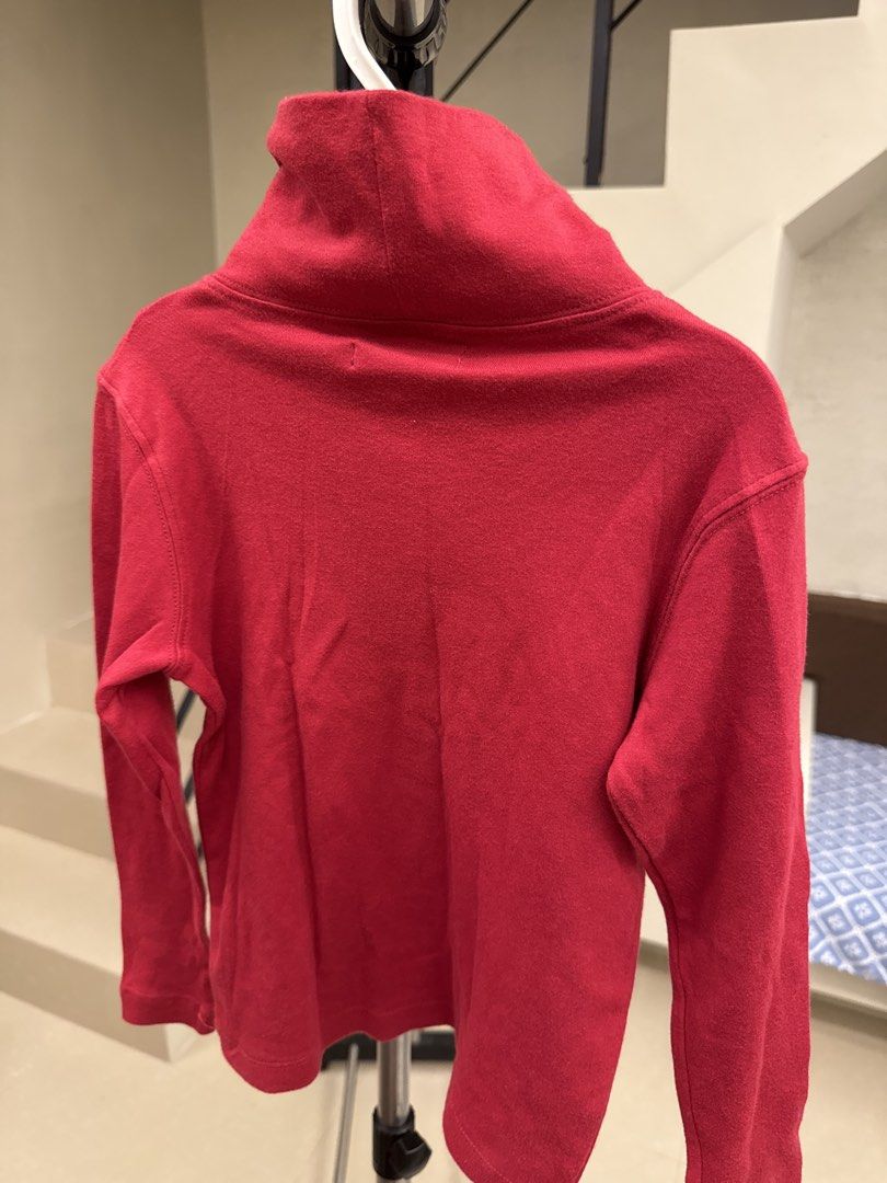Emboli Red Turtleneck Long Sleeve Top Size 110 (Category: Babies & Kids Fashion) located in Manila. Submitted by __nix (Listing ID 1470018549, Image 2). Description: - Brand: Emboli - Item: Red turtleneck top with long sleeves - Size: 110 (label at collar) - Material: Soft cotton knit fabric - Design: Plain front and back - Perfect for: Great layering piece for cooler weather.