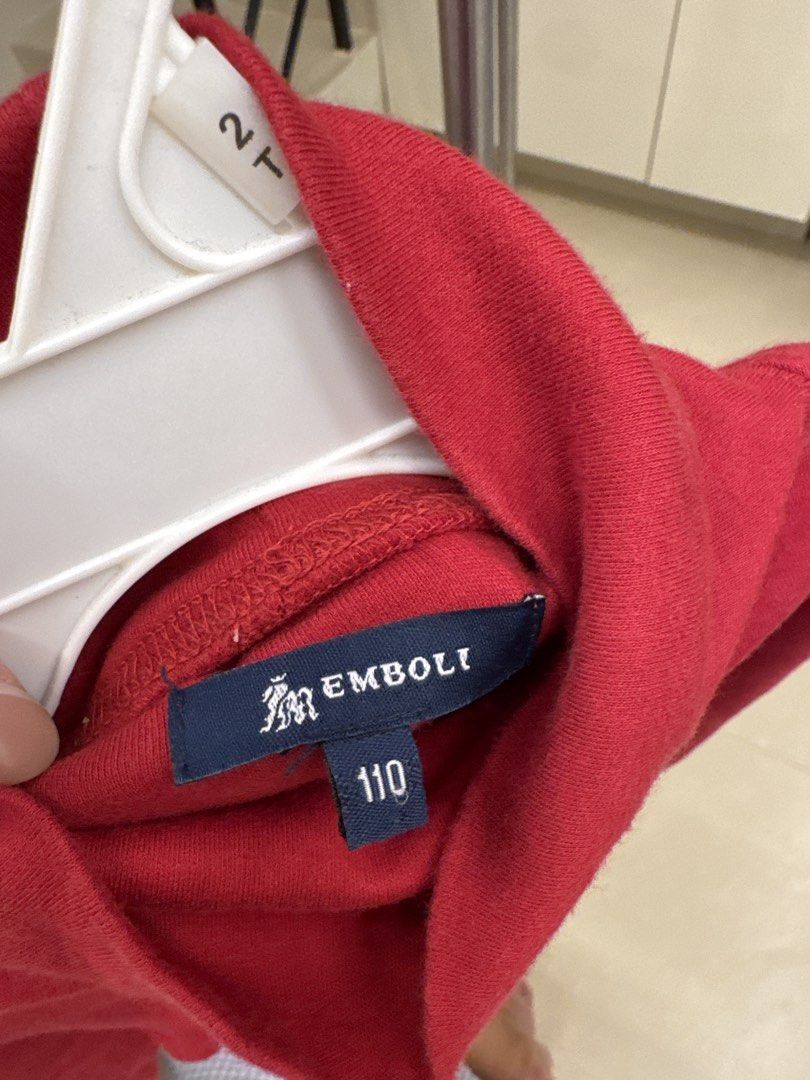 Emboli Red Turtleneck Long Sleeve Top Size 110 (Category: Babies & Kids Fashion) located in Manila. Submitted by __nix (Listing ID 1470018549, Image 3). Description: - Brand: Emboli - Item: Red turtleneck top with long sleeves - Size: 110 (label at collar) - Material: Soft cotton knit fabric - Design: Plain front and back - Perfect for: Great layering piece for cooler weather.