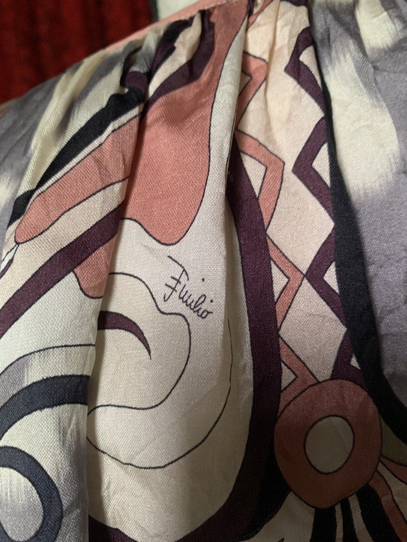 Emilio Pucci Silk Printed Dress Modello 47RM91 (Category: Dresses) located in Cebu City. Submitted by selamethrift (Listing ID 1470062894, Image 3). Description: - 100% Authentic Emilio Pucci printed silk dress, Made in Italy - Luxurious 100% silk fabric with the iconic signature Pucci pattern in muted purple, pink, black, and beige - Features a chic drawstring neckline with branded gold-tone metal aglets and long sleeves - Model: 47RM91 | Fabric