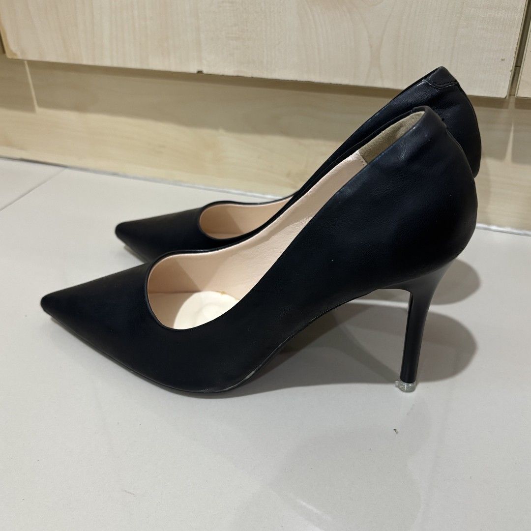 Erosska Black Pointed Toe Stiletto Heels Size 37 (Category: Heels) located in Quezon City. Submitted by slvrbullet (Listing ID 1470139176, Image 3). Description: - Brand: Erosska - Size: 37 - Color: Classic Black with light cream inner lining - Style: Minimalist pointed-toe stiletto - Condition: Clean soles, protective caps already attached on tips - Versatile: Perfect for office wear or evening events.