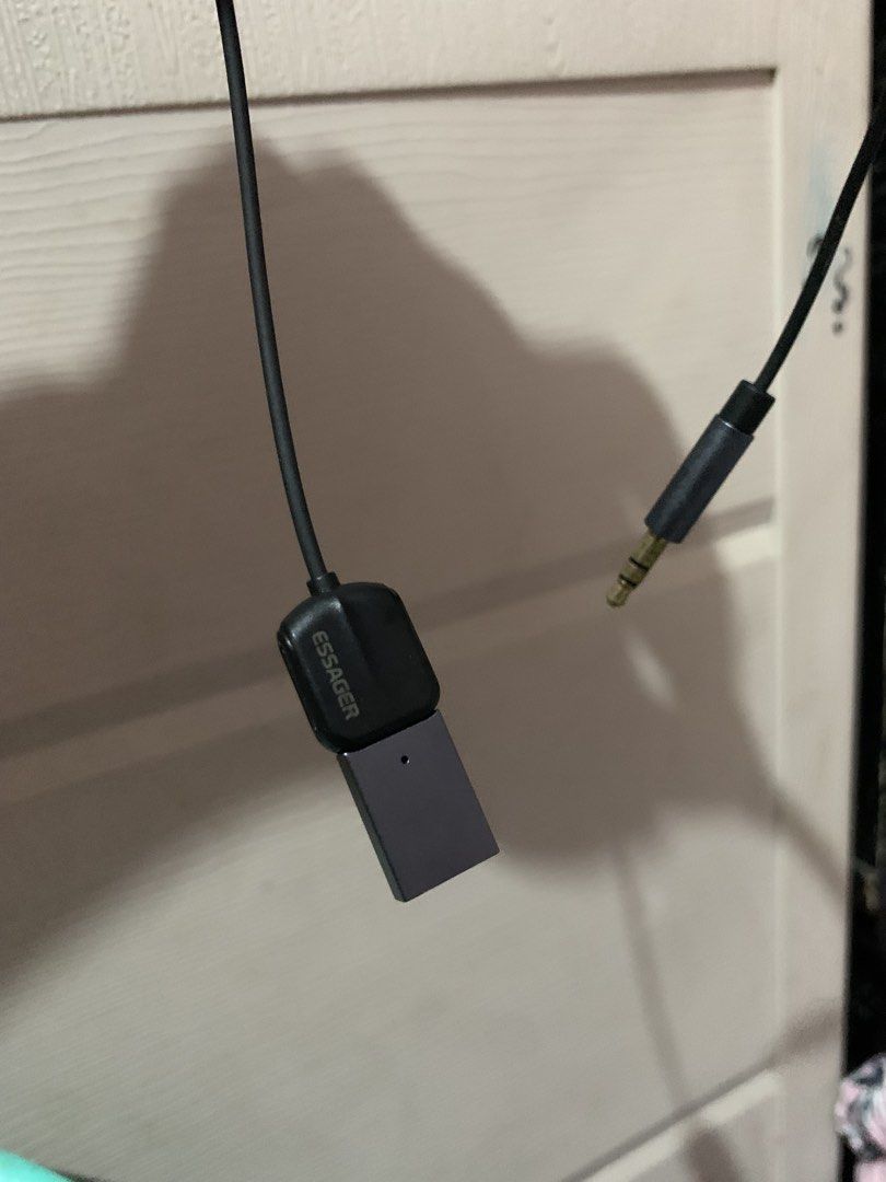 Essager USB to 3.5mm Aux Audio Adapter (Category: Cables & Adaptors) located in Valenzuela. Submitted by jaejoe (Listing ID 1470136171, Image 2). Description: - Brand: Essager - Type: USB to 3.5mm Aux Audio Adapter - Color: Black housing with silver USB connector - Cable: Flexible coiled wire for easy stretching and clutter-free setups - Compatibility: Great for connecting various audio devices - Condition: Brand new and ready to use.