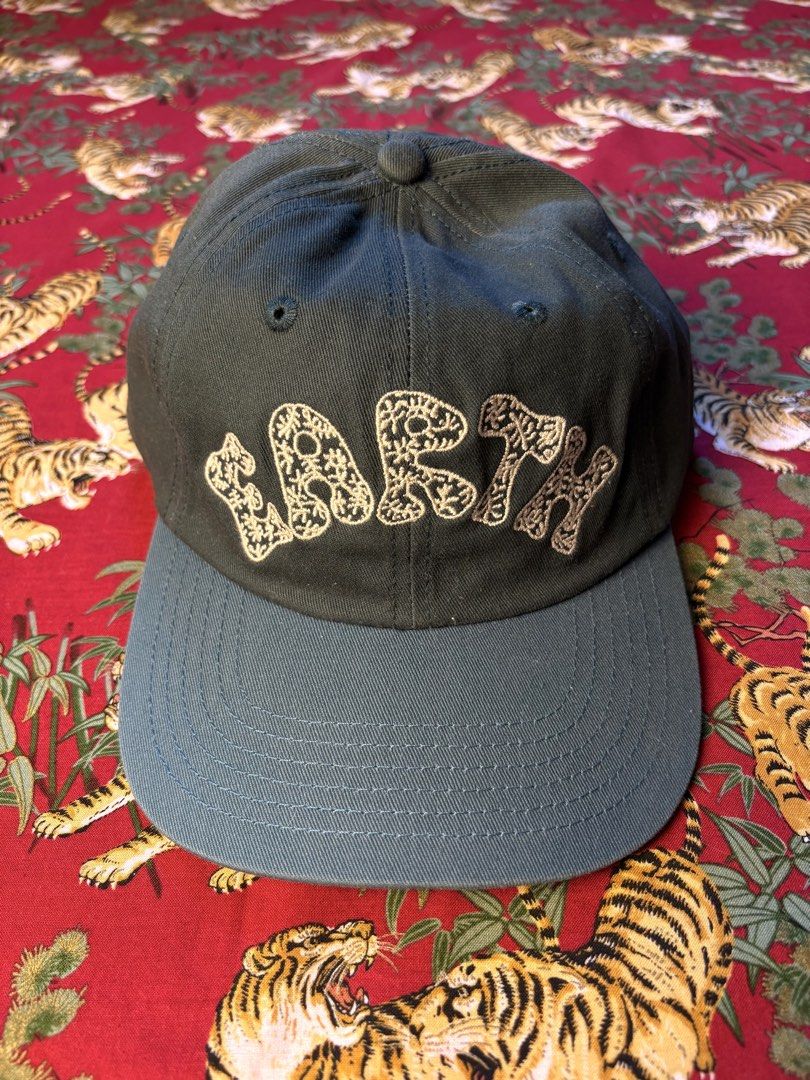 Extra Vitamins “Earth” Unstructured Contrast Cap - Blue/Green (Category: Caps & Hats) located in Caloocan City. Submitted by ruvendnewborn (Listing ID 1470048878, Image 2). Description: Extra Vitamins “Earth” Unstructured Contrast Cap - Blue/Green - OSFA - Like new condition - Made of 100% cotton - 6-panel unstructured cap - “Earth” floral patterned embroidery on front - Adjustable strap with embossed “sun” metal clasp PHP 1000.