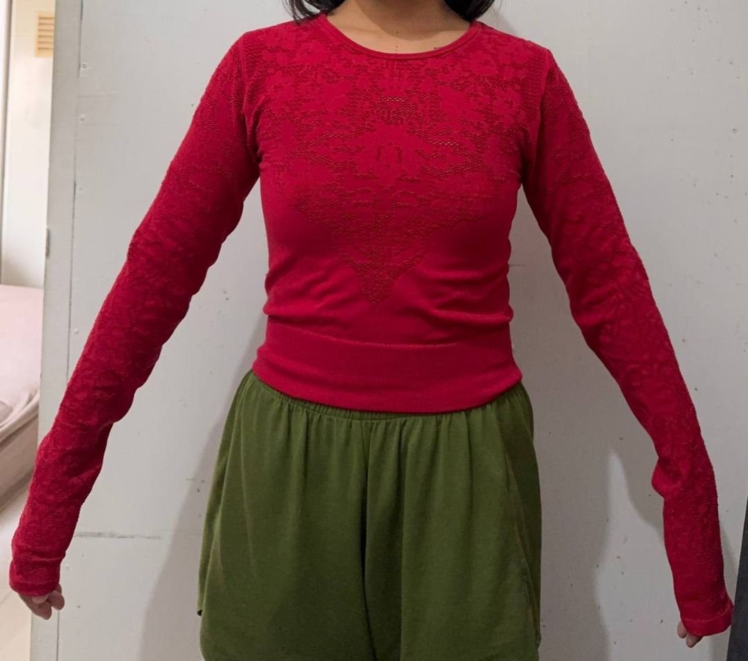 Fabletics Red Seamless Long Sleeve Top Size S (Category: Longsleeves) located in Santa Rosa. Submitted by sherikasstuff (Listing ID 1469958429, Image 1). Description: - Brand: Fabletics - Item: Seamless Long Sleeve Top - Color: Bright Red - Size: Small - Details: Textured knit pattern on chest and sleeves, crew neckline, ribbed hem and cuffs - Material: Stretchy and comfortable fabric - Condition: Clean, worn only a few times - Best for: Aerial w