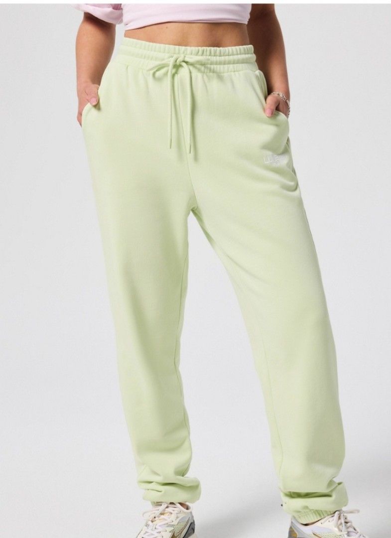 Fabletics year round terry sweat pants small nike adidas P1 (Category: Other Bottoms) located in San Pablo. Submitted by allyourbrandedneeds (Listing ID 1469969533, Image 3). Description: - Brand: Fabletics Luxe 360 - Color: Light mint green - Fit: High-waisted with adjustable drawstring - Features: Practical side pockets, cuffed ankles, white embroidered logo near left pocket - Material: Cozy fleece, super comfortable - Condition: Clean, no obvi