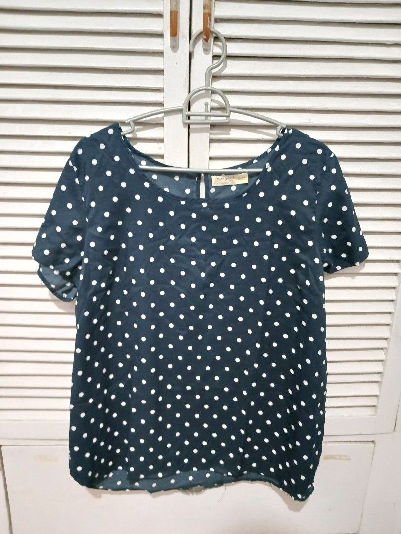 Faded Glory Navy Blue Polka Dot Blouse XXL (Category: Blouses) located in Quezon City. Submitted by rdonelle (Listing ID 1470081888, Image 1). Description: - Brand: Faded Glory - Design: Navy blue with white polka dots - Size: XXL (20) - Material: 100% lightweight polyester - Sleeves: Short sleeves - Closure: Easy slip-on with back keyhole button - Condition: Comfort fit, ideal for casual daily wear.