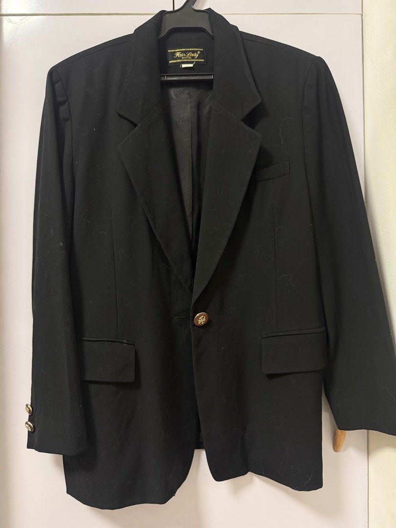 Fair Lady Black Vintage Blazer Jacket (Category: Coats, Jackets and Outerwear) located in Quezon City. Submitted by lovedbymaxandmikoy (Listing ID 1470134972, Image 1). Description: - Brand: Fair Lady - Style: Vintage black blazer with structured shoulders and peak lapels - Closure: Single-button front with decorative gold buttons on cuffs - Pockets: Front flap pockets and one welt chest pocket - Details: Fully lined interior, classic tailoring -