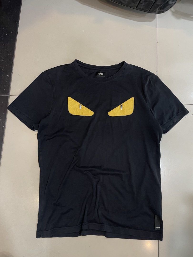 Fendi Black T-Shirt Size 50 (Category: Tshirts & Polo Shirts ) located in Cainta. Submitted by riszizlux (Listing ID 1470017675, Image 1). Description: - Color: Black - Size: 50 - Material: Premium cotton with stylish lamb leather details - Design: Standard crew neck, classic basic fit - Authenticity: Real tag and authentication label attached inside - Styling: Perfect for everyday wear, easily matches with jeans or joggers.