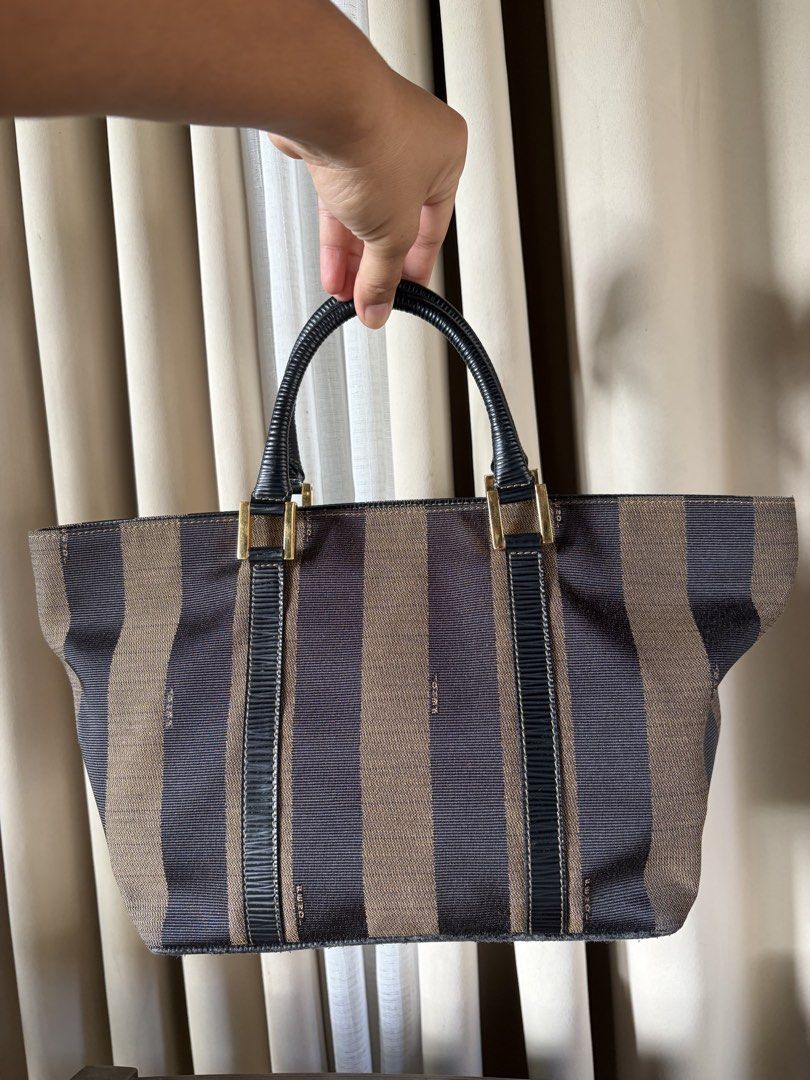 Fendi Pequin Tote (Category: Luxury Bags & Wallets) located in Baler. Submitted by waikikisurfer (Listing ID 1470018013, Image 2). Description: Fendi Pequin Tote Small to Med Size Sign of use- Bottom Base Lining, see photos for reference Handle, Body Inside and Out- Goods FF underzip Coded Japan Sourced Offer your price for sure buyer 💰.