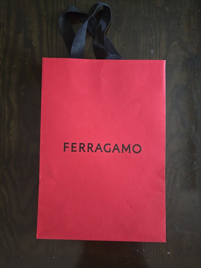Ferragamo paper bag (Category: Luxury Bags & Wallets) located in San Juan City. Submitted by super.saver8 (Listing ID 1469996824, Image 1). Description: Ferragamo paper bag. medium size. good for small bag or wallets.