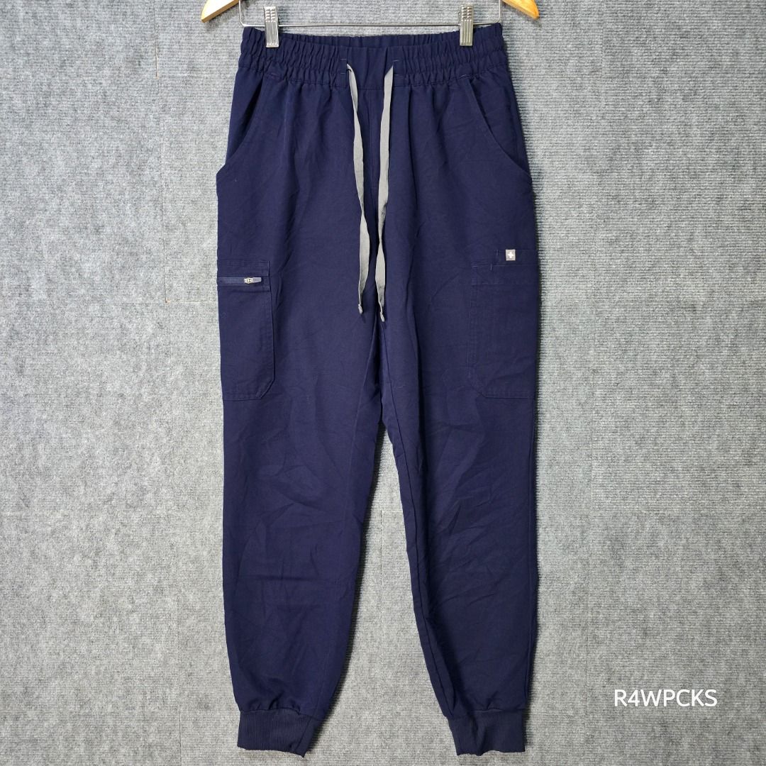 FIGS UMAN CASUAL NAVY JOGGER SCRUB PANTS (Category: Other Bottoms) located in San Mateo. Submitted by r4wpcks (Listing ID 1470088730, Image 2). Description: Size on Tag: Small Tall Best Fit: 27 - 29 inches Waist: 25 - 30 inches Length: 39 inches Leg Hole / Hem: 4 inches Condition: 9.5/10 Color Rate: 9.5/10 Issue: None COLOR MAY VARY DUE TO LIGHTING Location: San Mateo Rizal, near Marikina J&T/Lalamove courier, shipping fee should be handled by th