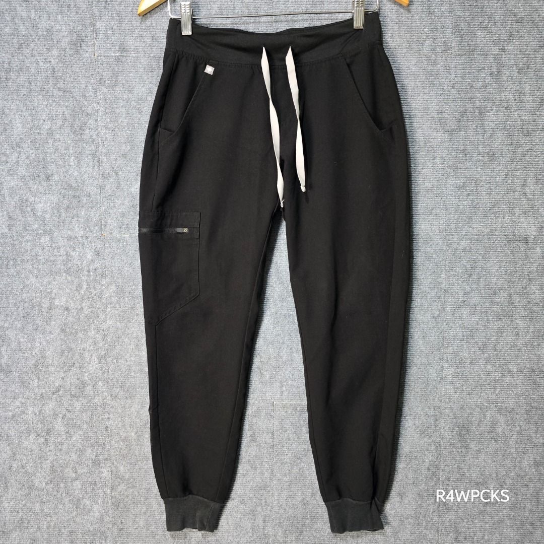 FIGS ZAMORA BLACK JOGGER SCRUB PANTS (Category: Other Bottoms) located in San Mateo. Submitted by r4wpcks (Listing ID 1470085334, Image 2). Description: Size on Tag: XS Petite Best Fit: 25 - 27 inches Waist: 25 - 29 inches Length: 35 inches Leg Hole / Hem: 3.5 inches Condition: 8.5/10 Color Rate: 9/10 Issue: Burn mark see last image COLOR MAY VARY DUE TO LIGHTING Location: San Mateo Rizal, near Marikina J&T/Lalamove courier, shipping fee should b