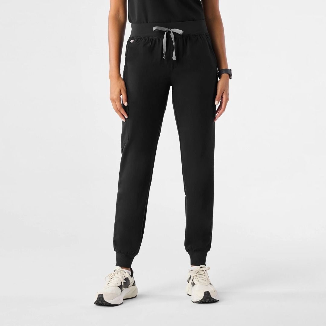 FIGS ZAMORA BLACK JOGGER SCRUB PANTS (Category: Other Bottoms) located in San Mateo. Submitted by r4wpcks (Listing ID 1470085334, Image 1). Description: Size on Tag: XS Petite Best Fit: 25 - 27 inches Waist: 25 - 29 inches Length: 35 inches Leg Hole / Hem: 3.5 inches Condition: 8.5/10 Color Rate: 9/10 Issue: Burn mark see last image COLOR MAY VARY DUE TO LIGHTING Location: San Mateo Rizal, near Marikina J&T/Lalamove courier, shipping fee should b