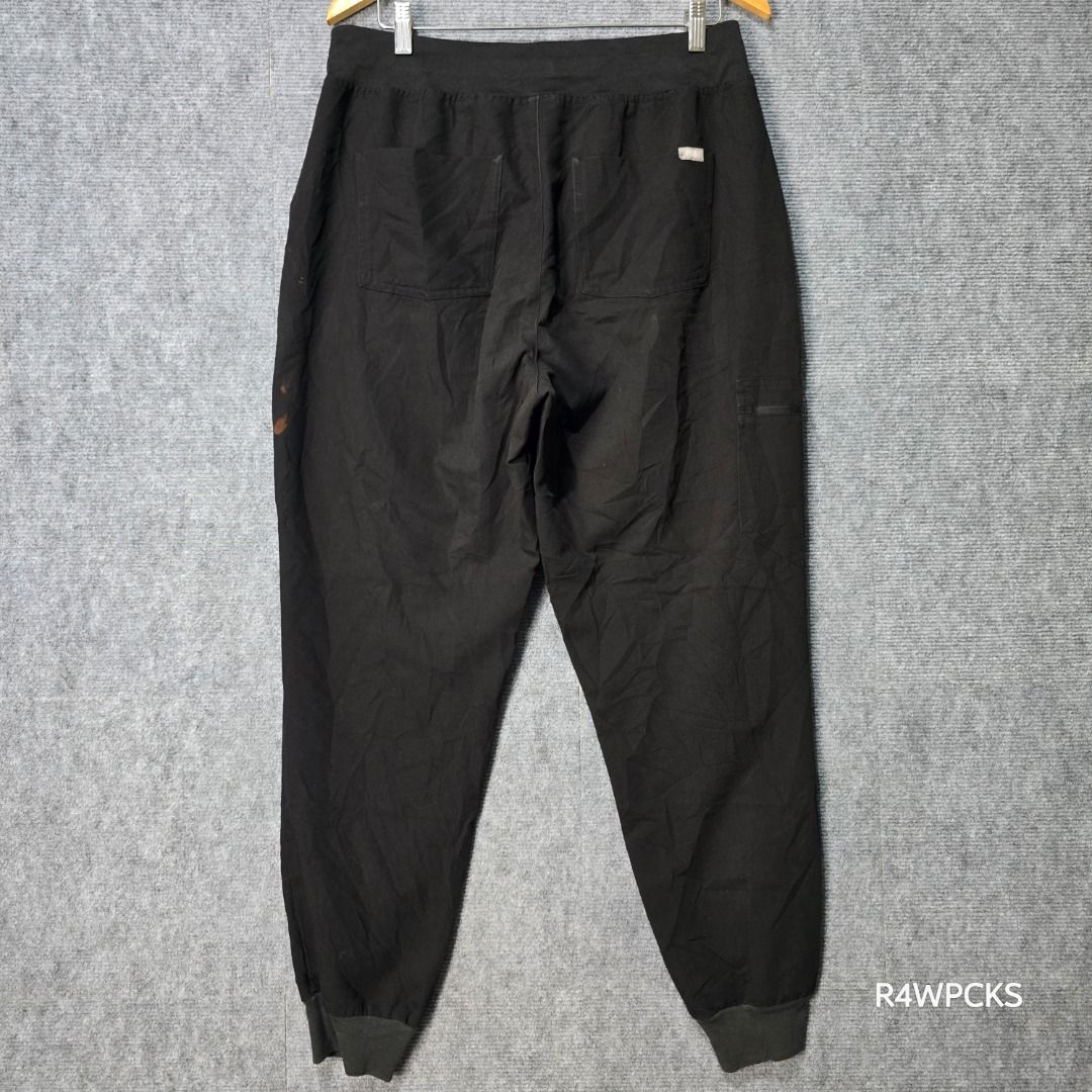 FIGS ZAMORA BLACK JOGGER SCRUB PANTS L (Category: Other Bottoms) located in San Mateo. Submitted by r4wpcks (Listing ID 1470089908, Image 3). Description: Size on Tag: Large Best Fit: 32 - 34 inches Waist: 30 - 36 inches Length: 39 inches Leg Hole / Hem: 4 inches Condition: 8/10 Color Rate: 8/10 Issue: Signs of use, bleach stain COLOR MAY VARY DUE TO LIGHTING Location: San Mateo Rizal, near Marikina J&T/Lalamove courier, shipping fee should be ha
