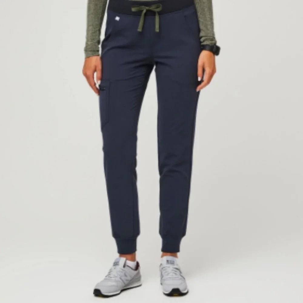 FIGS ZAMORA QUIET NAVY JOGGER SCRUB PANTS (Category: Other Bottoms) located in San Mateo. Submitted by r4wpcks (Listing ID 1470093461, Image 3). Description: Size on Tag: XXS Petite Best Fit: 23 - 24 inches Waist: 23 - 26 inches Length: 34 inches Leg Hole / Hem: 3.5 inches Condition: 9/10 Color Rate: 9/10 Issue: Minimal loose stitch on back pocket COLOR MAY VARY DUE TO LIGHTING Location: San Mateo Rizal, near Marikina J&T/Lalamove courier, shippi