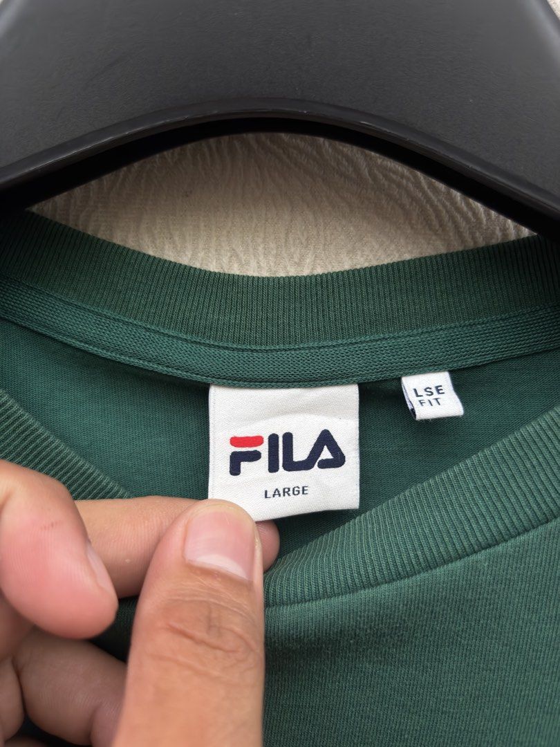 Fila Shirt (Category: Tshirts & Polo Shirts ) located in Baybay. Submitted by thrift.ed2023 (Listing ID 1470036636, Image 3). Description: Fila Shirt Large 21x30 No Issue Need Wash Good as New .